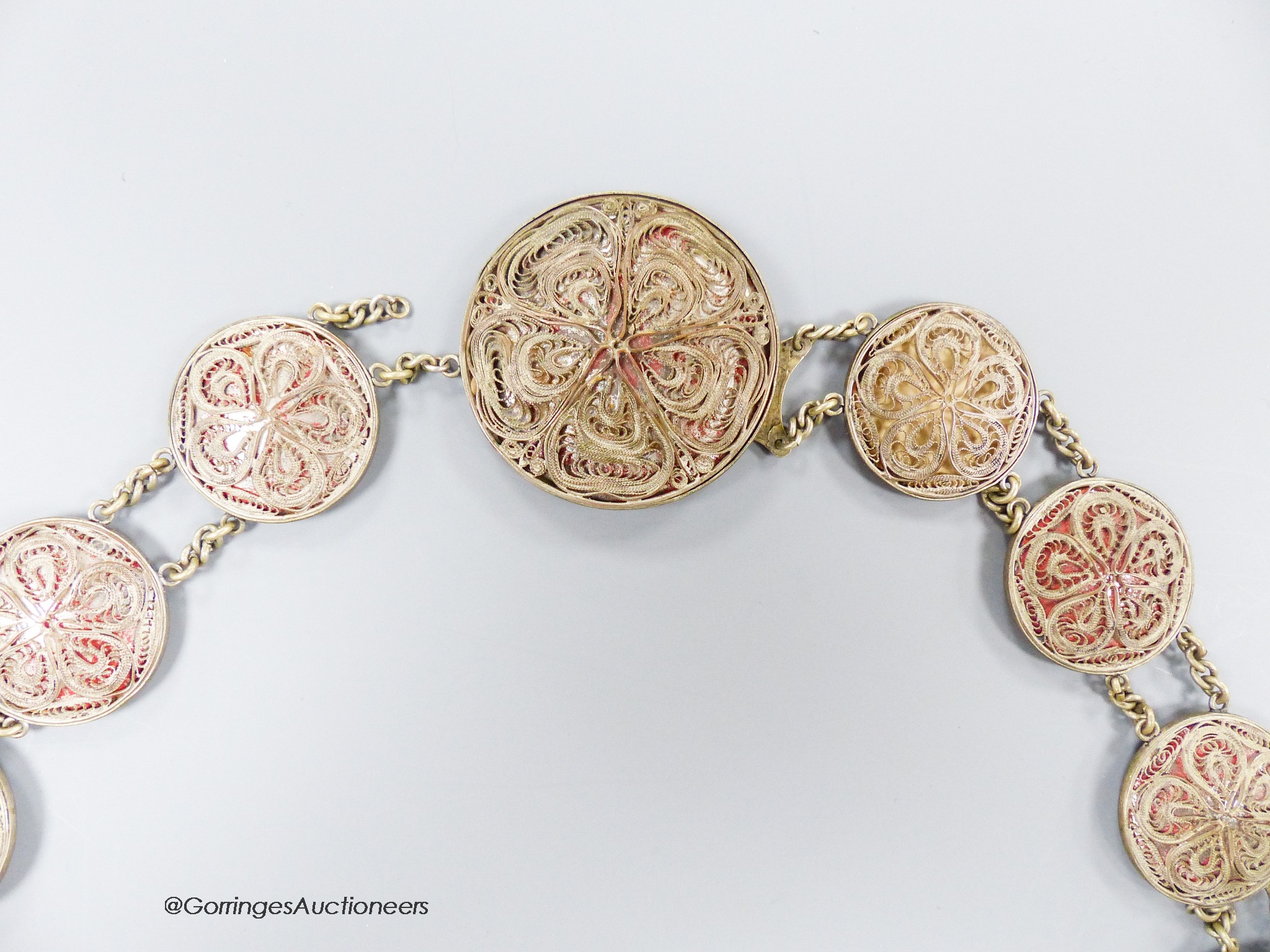 A Russian white metal and filigree belt, length 68cm
